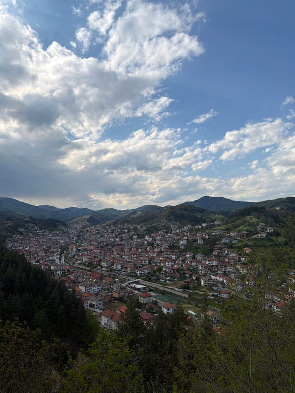 Hillside town Nedelino Bulgaria captured in afternoon aerial view