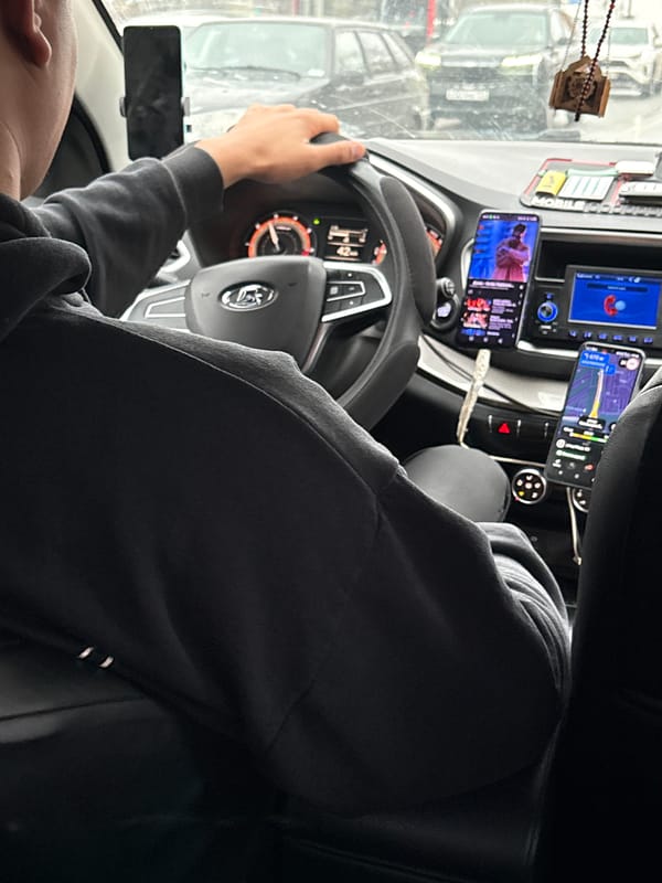 Driver operates multi-screen equipped vehicle in Perm, Russia