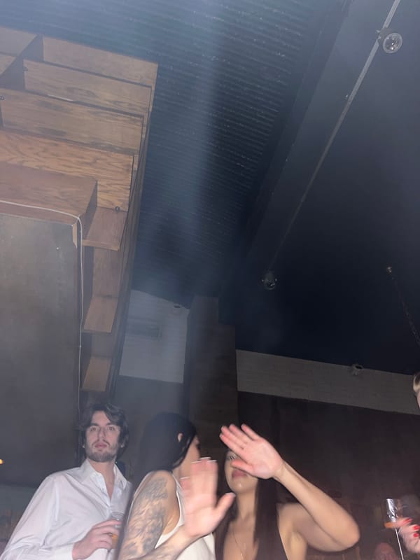 Late night social gathering observed in Moscow indoor venue