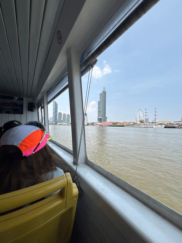 Morning boat ride captures Bangkok river and city skyline