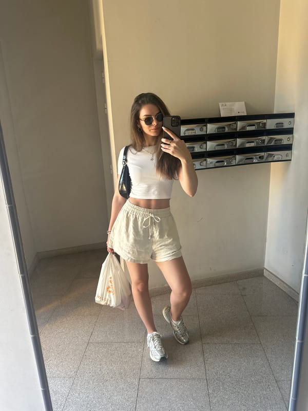 Woman takes selfie, handles pastry in Beniflà Spain