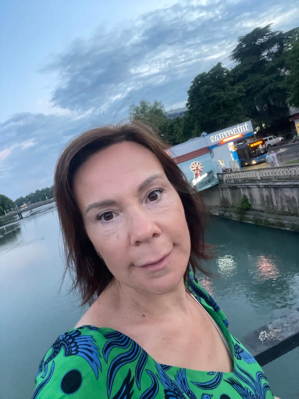 Woman takes selfies at multiple Sochi landmarks during evening tour