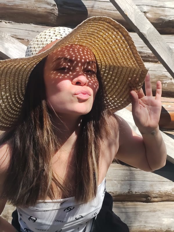 Young woman photographed in sunlit portrait in rural Russia