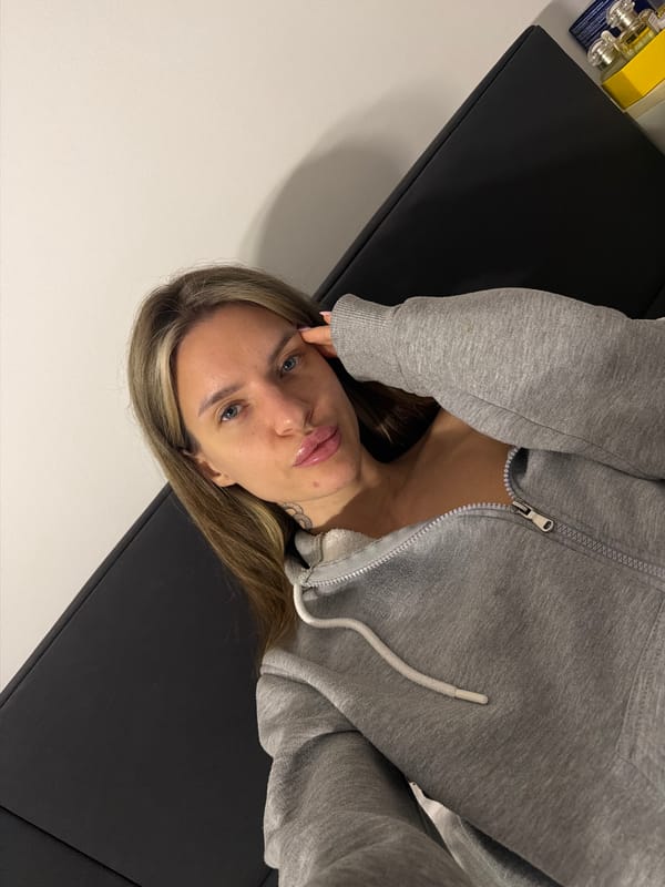 Woman on examination table in Berlin medical setting