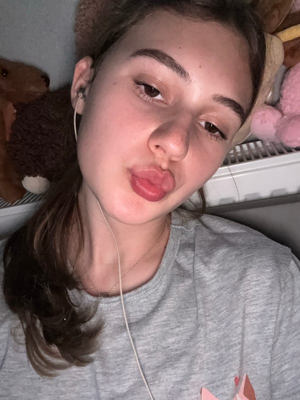 Bedroom selfie session in Panagyurishte with a Lenovo laptop nearby