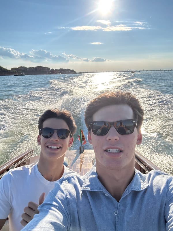 Boat ride on the Venice lagoon, cityscape in the distance
