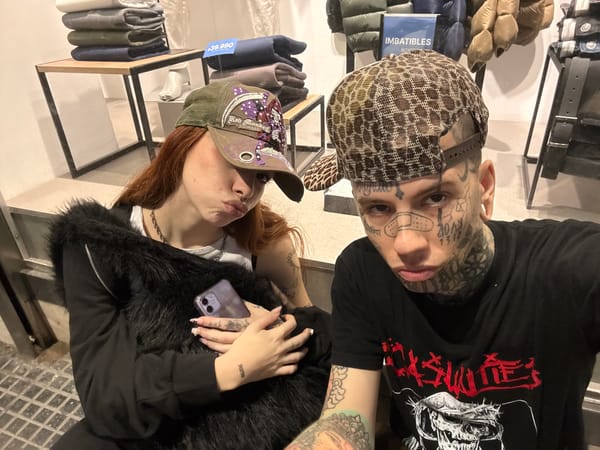 Two people photographed in Buenos Aires retail location