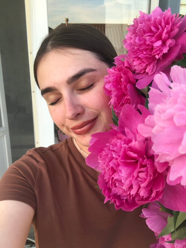 Peonies, cats, and selfies on a quiet afternoon in Noviy