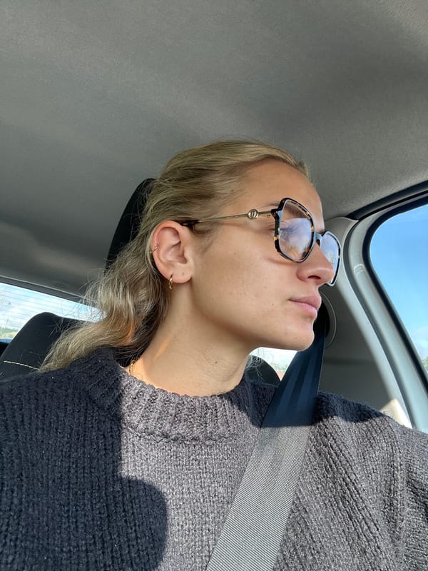 Young passenger sleeps in car in Chabanière, France