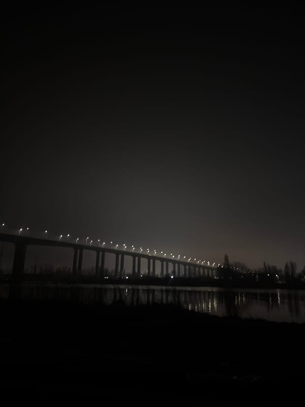Foggy night scenes captured around illuminated Varna bridge