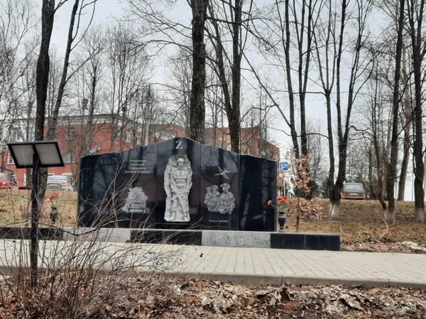 Spring flowers bloom near military monument in Krasnogorskoye
