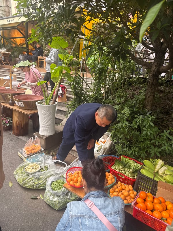 Morning food market and street vendors active in Yuzhong District