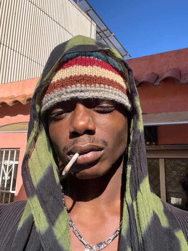 Man poses for photos during morning smoke break in Barcelona