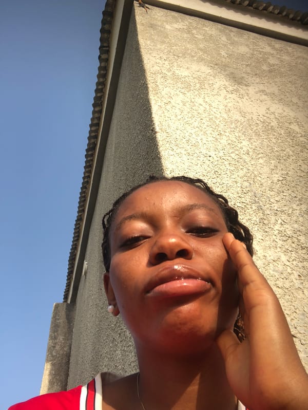 Woman in Bulls jersey photographed in Nigeria morning session