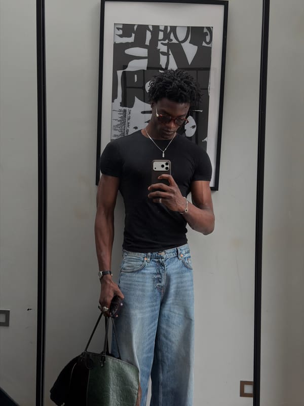 Man takes mirror selfie in London indoor location