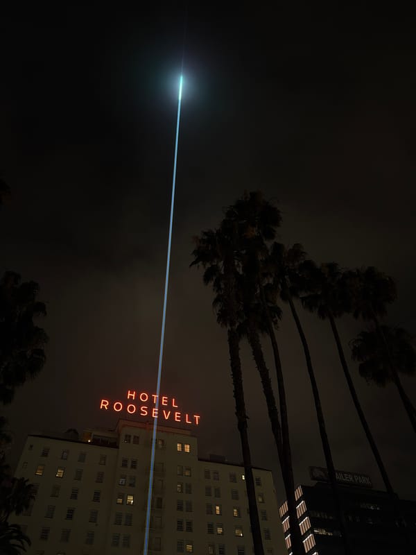 Hotel Roosevelt's neon sign illuminates Los Angeles night scene