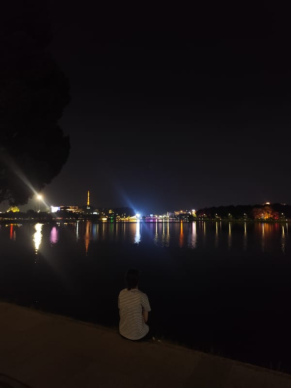 Evening lakeside activities observed at Ho Xuan Huong Lake