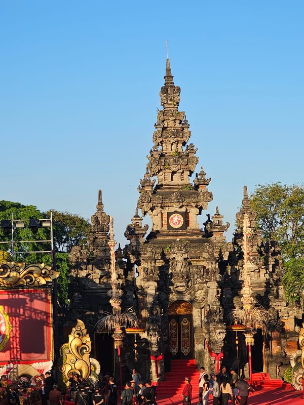 Outdoor cultural performance at a Balinese temple in Denpasar