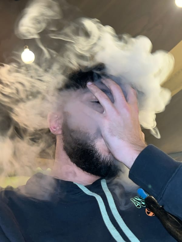 Young men socialize, smoke in Damascus cafes Sunday evening