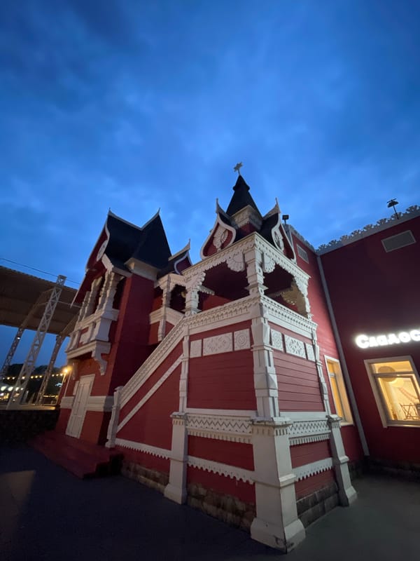 Vologda's historic center at dusk, lights coming on