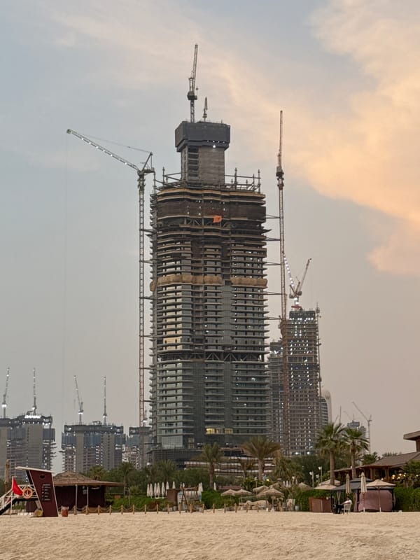 Dubai's JBR beach at golden hour, Marina skyline in view