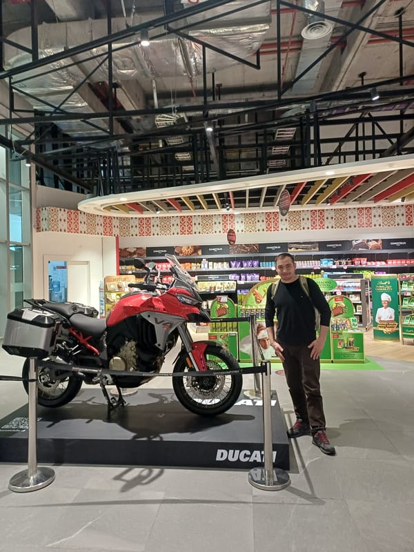 Red Ducati on display at Santiago Airport duty-free shop