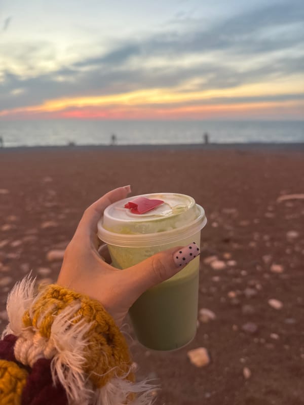 Evening sunset and beverage captured in coastal Batumi
