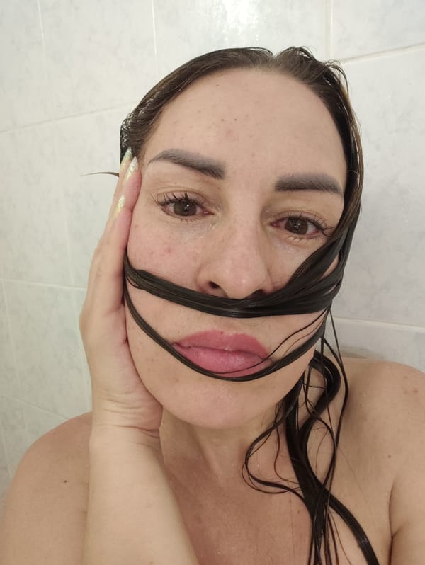 Playful shower selfie series from an Almaty bathroom