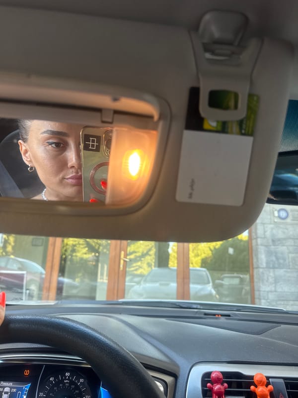 Car mirror selfie session in Tbilisi