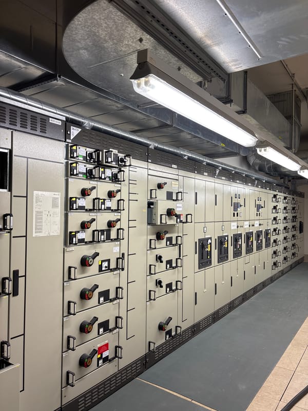 Inside a Mannheim electrical substation, panels and cable runs throughout