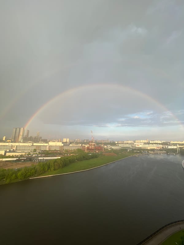 Double rainbow appears over Khimki, Russia cityscape