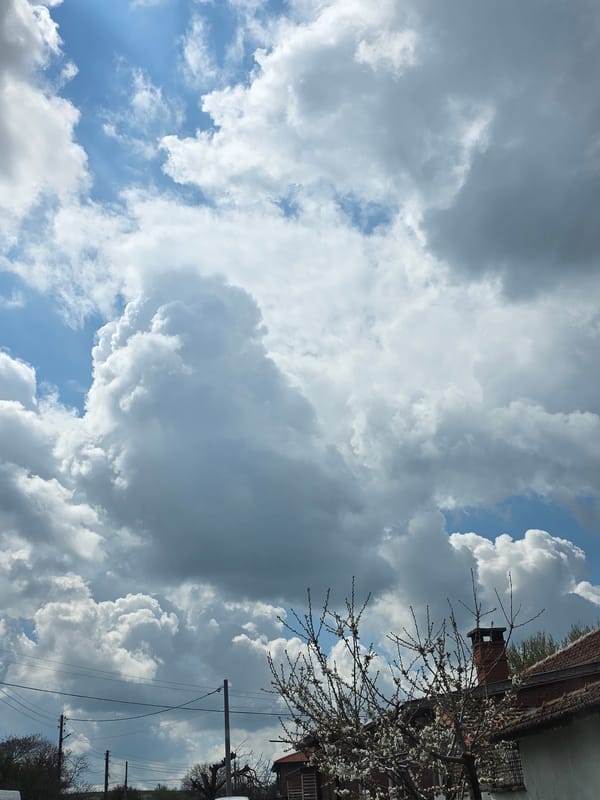 Mixed cumulonimbus clouds observed with blue sky patches visible