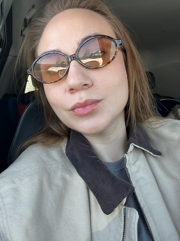 Woman takes selfies in vehicle, residence in Kharnavy, Russia