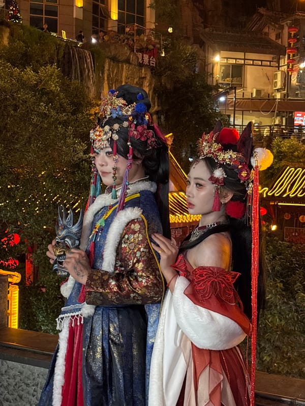 Traditional costume gathering documented at Chongqing's Hongyadong complex