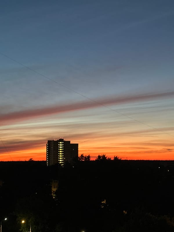 City sunset watched from multiple windows and angles