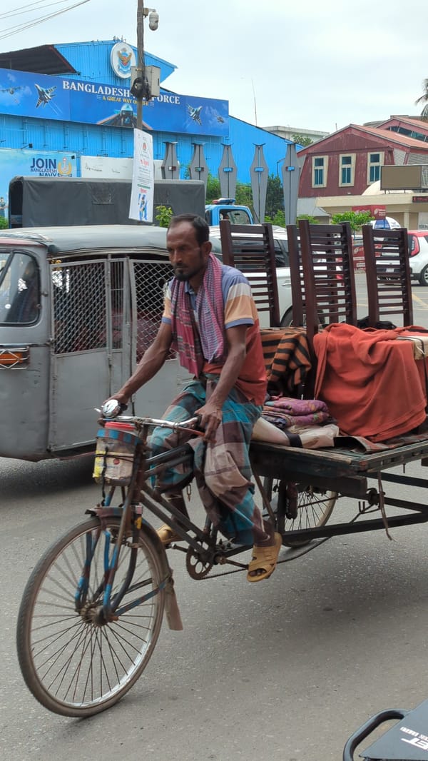 Morning street life documented in Dhaka intersection