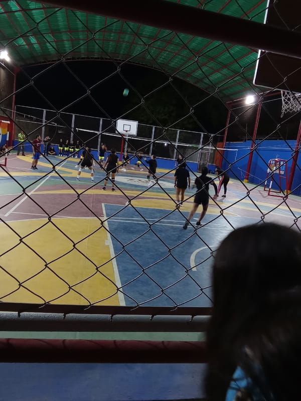 Nighttime volleyball game documented in Juan Griego, Venezuela