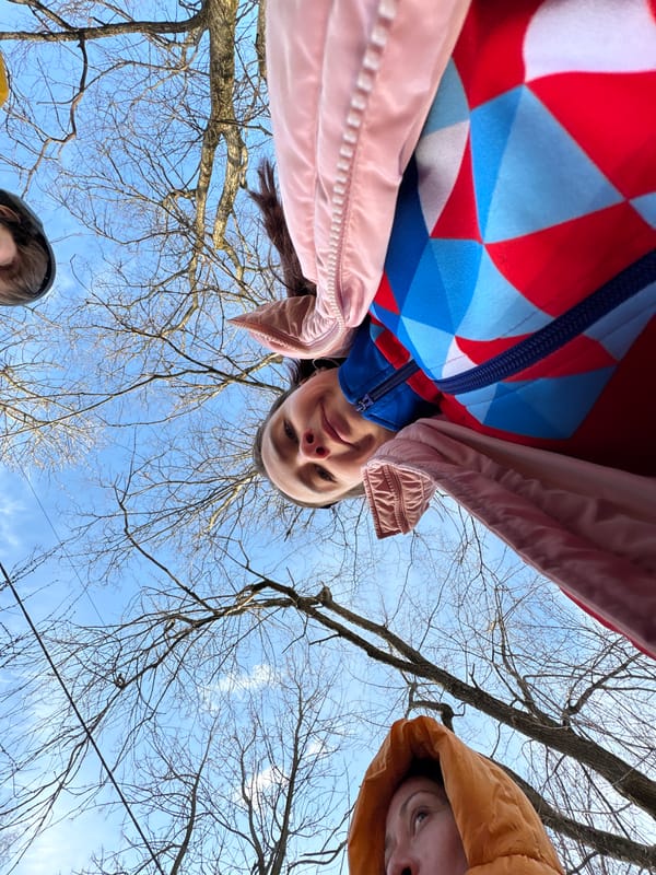 Three people photographed under clear skies in Berezniki