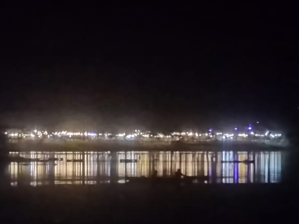 Nighttime waterfront scenes captured in Lhokseumawe, Indonesia
