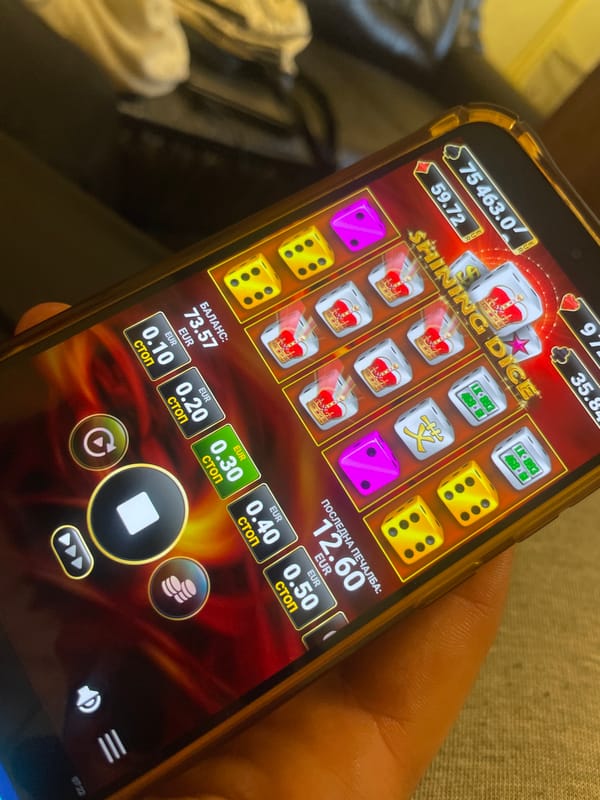 Person plays online dice gambling game on phone in Bulgaria