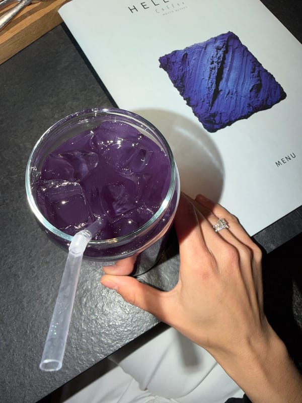 Woman browses menu at Krasnoyarsk cafe
