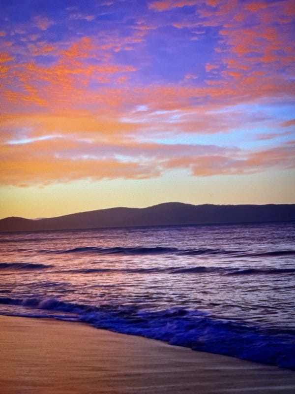 Sunset colors over a calm beach in Parvomaitsi, Bulgaria