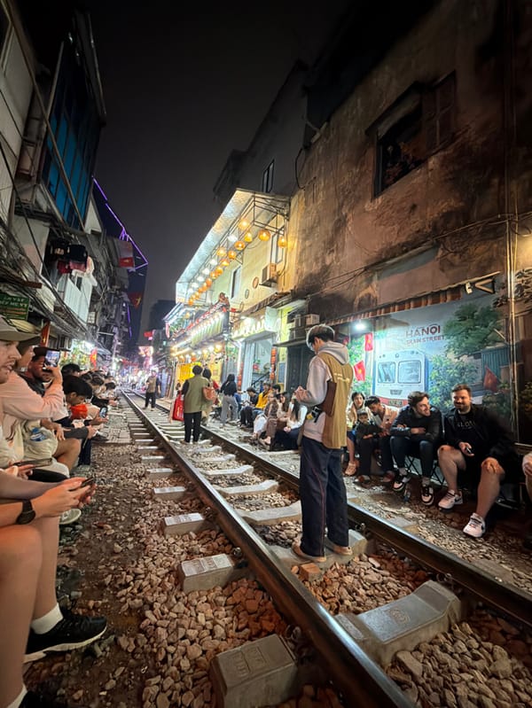 Train Street draws crowds as passenger trains navigate Hanoi corridors