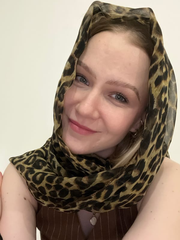 Woman in leopard scarf photographed indoors in Khimki