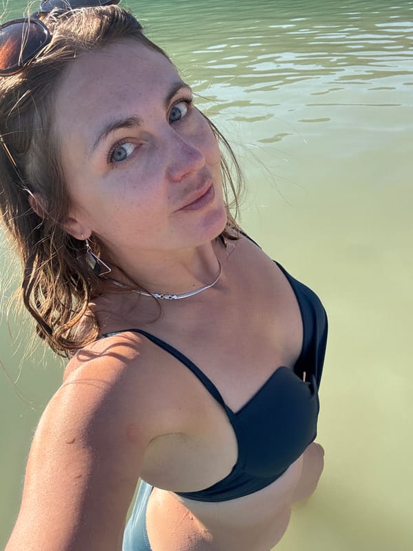 Lazy afternoon swim in a clear French lake