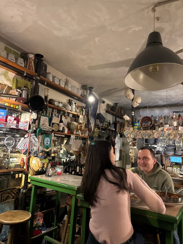 Evening dining scene with dog at Sofia establishment