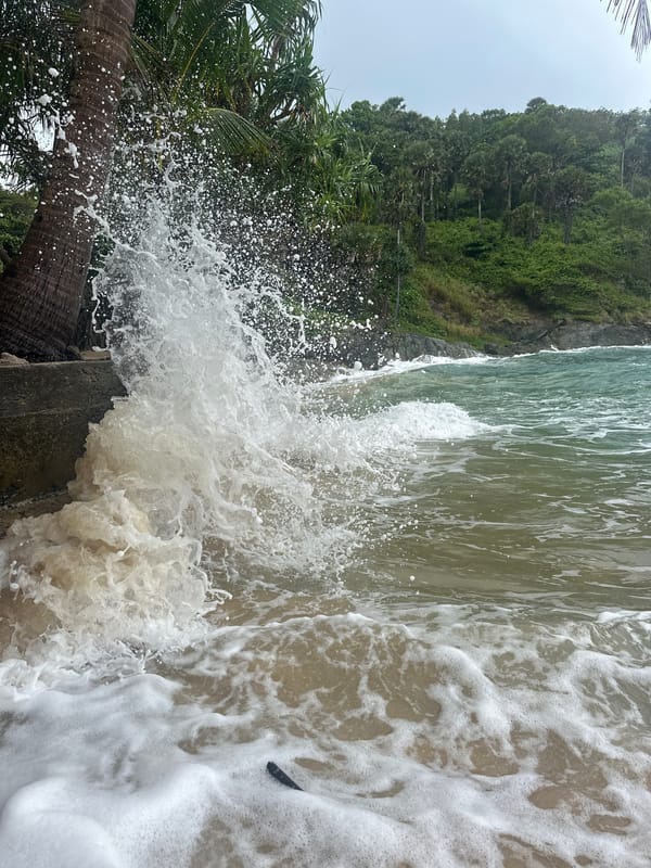 Rough surf and moody skies at Rawai Beach, Phuket