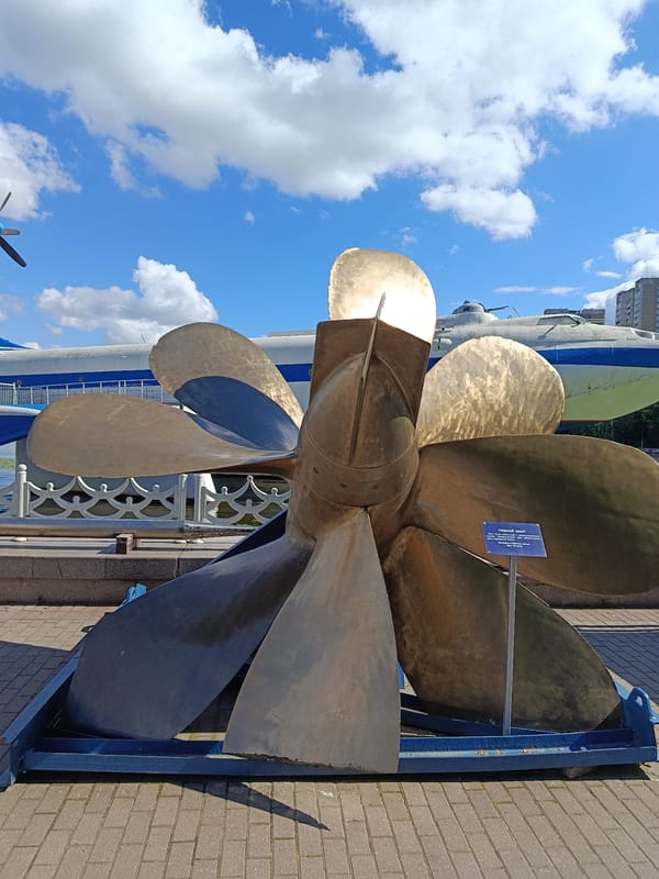 Naval museum outdoor exhibits along a Russian waterfront