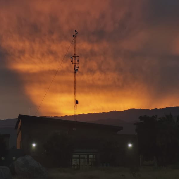 Sunset photograph captures lit building in Catamarca, Argentina
