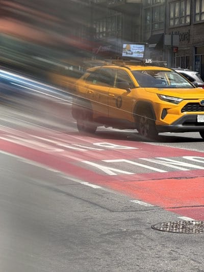 Yellow taxi drives in NYC bus-only lane